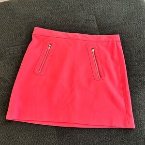 Gap pink mini skirt with zipper pockets. Size 8. Like new